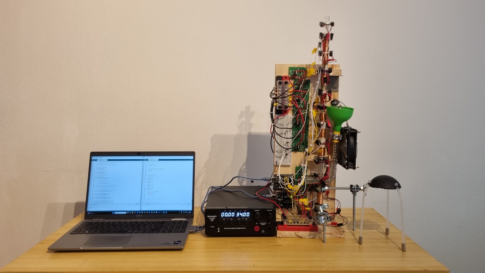 The seven-stage Project COELI laboratory demonstrator with its control computer, electronics and receiver
